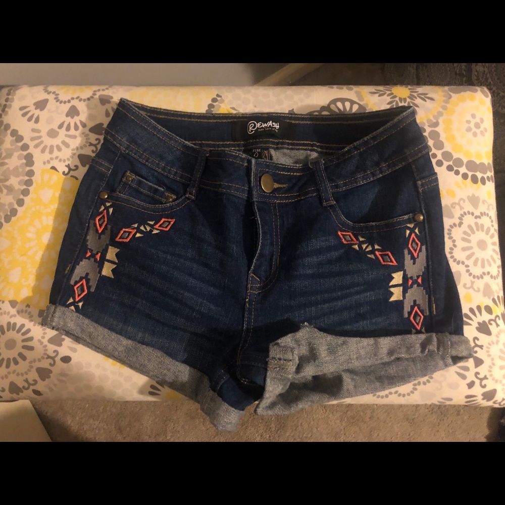High waisted jean shorts with colored Aztec print
